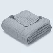Morvelle Sky Blue muslin cotton blanket folded on white