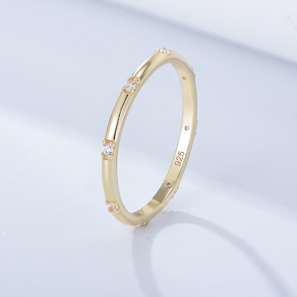 Stylish Golden Tone Wedding Band with Gemstone Accents Shineofidamond
