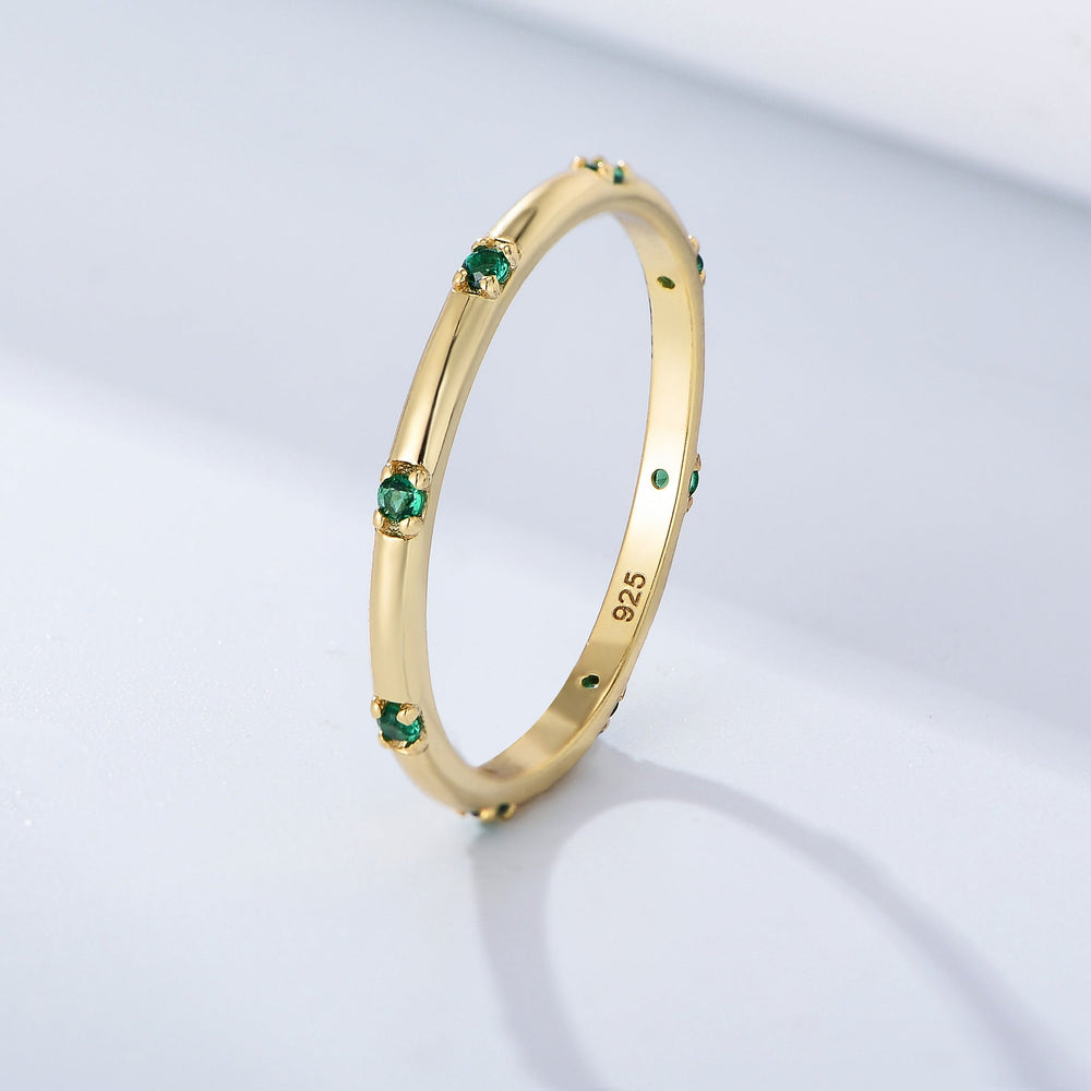 Stylish Golden Tone Wedding Band with Gemstone Accents Shineofidamond